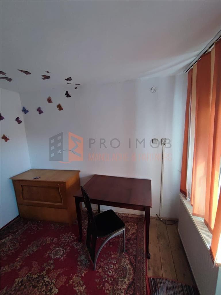 Casa tip parter + mansarda in zona Centru